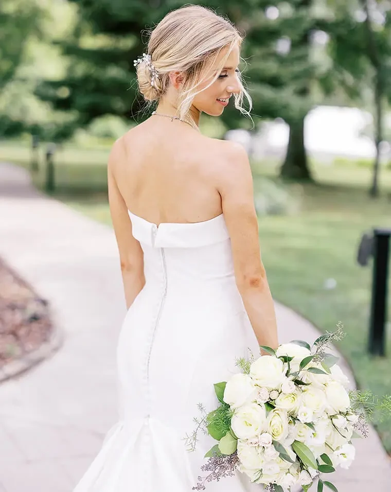 woman wearing bridal gown