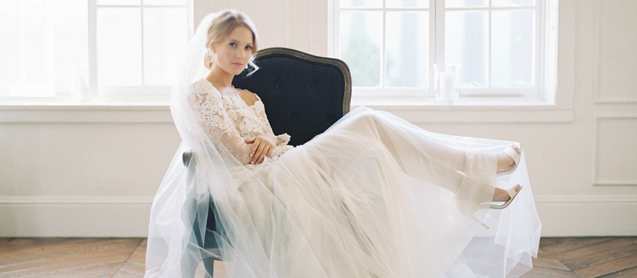 Model wearing a white gown